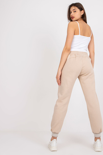 Béžové tepláky pro ženy s...