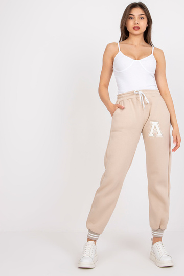 Béžové tepláky pro ženy s... 2