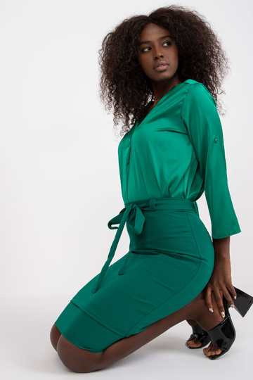 Tmavě zelená tužková sukně...