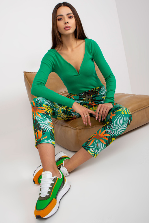 Zelené vzorované tepláky s kapsami