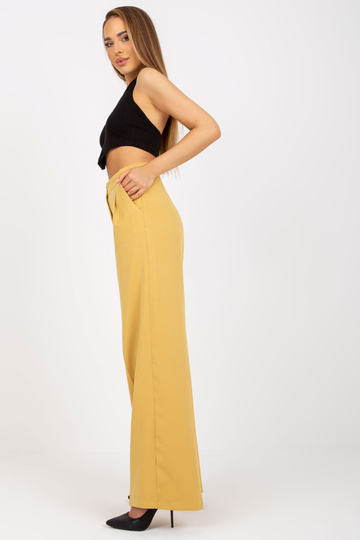 Tmavě žluté látkové kalhoty... 2