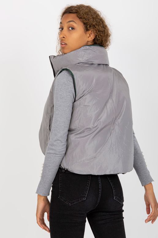 Tmavě zelená krátká péřová vesta s...