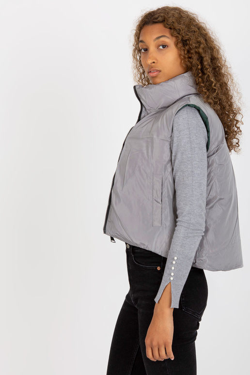 Tmavě zelená krátká péřová vesta s...