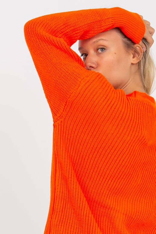 Oranžový kardigan s velkými knoflíky...