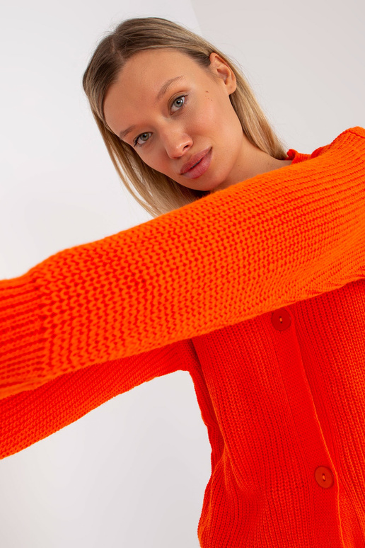 Oranžový kardigan s velkými knoflíky...