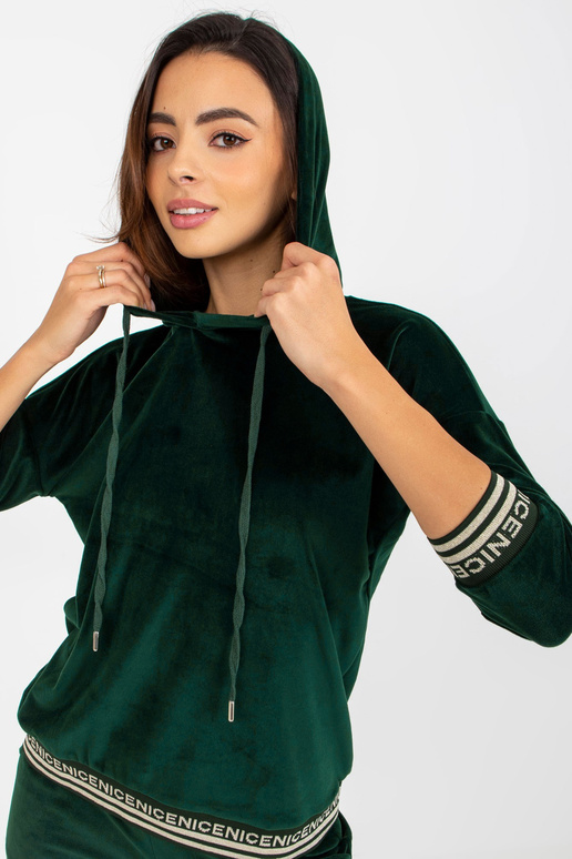 Dunkelgrünes zweiteiliges Veloursset...