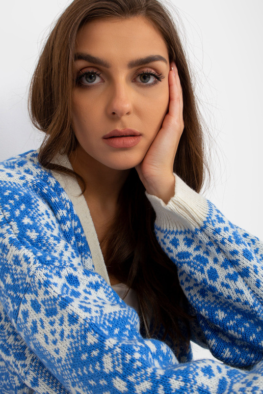 Bílo-modrý vzorovaný dámský kardigan...