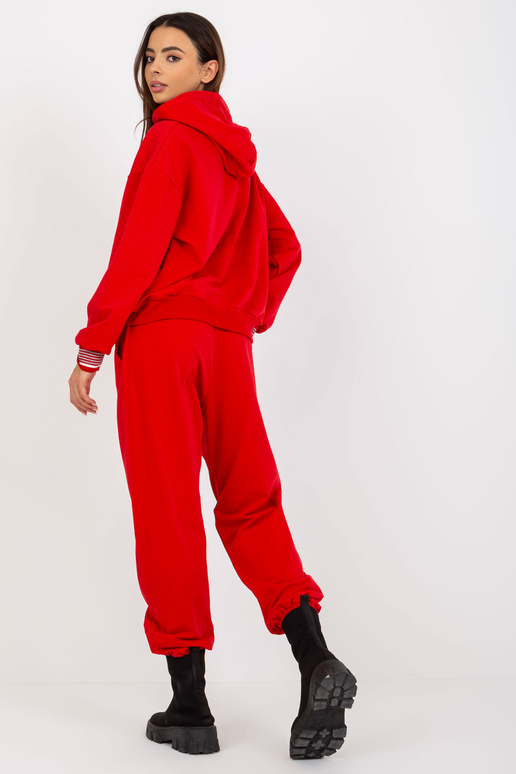 Rotes zweiteiliges Jogging-Set s... Rotes zweiteiliges Jogging-Set s...