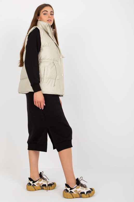 Světle béžová péřová vesta z eko kůže...