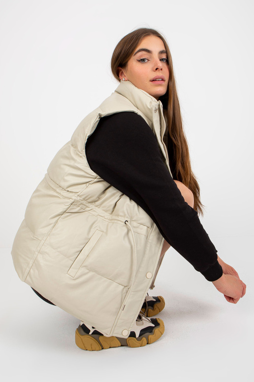 Světle béžová péřová vesta z eko kůže...