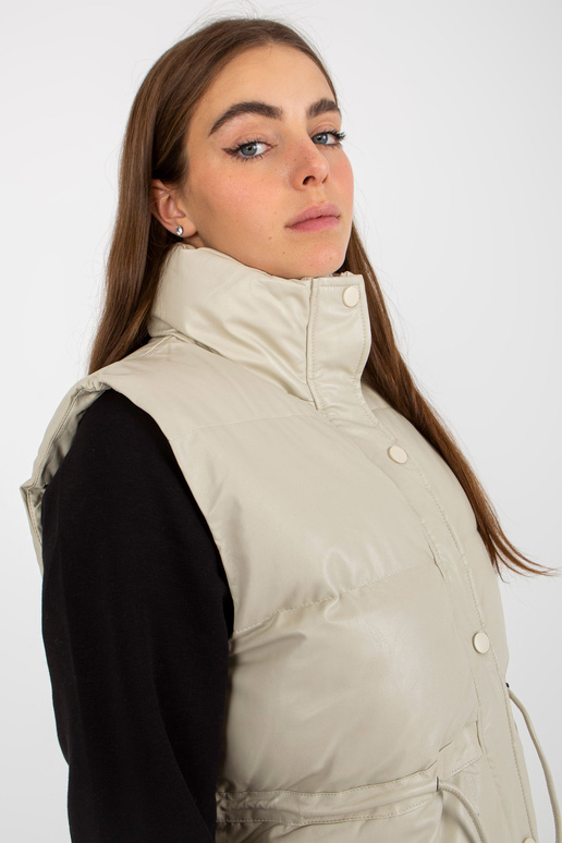 Světle béžová péřová vesta z eko kůže...
