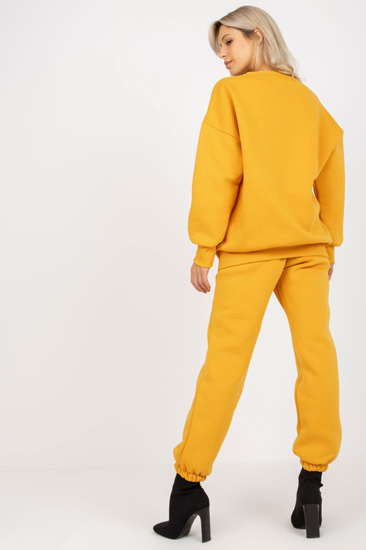 Tmavě žlutá dámská mikina s oversize... Tmavě žlutá dámská mikina s oversize...