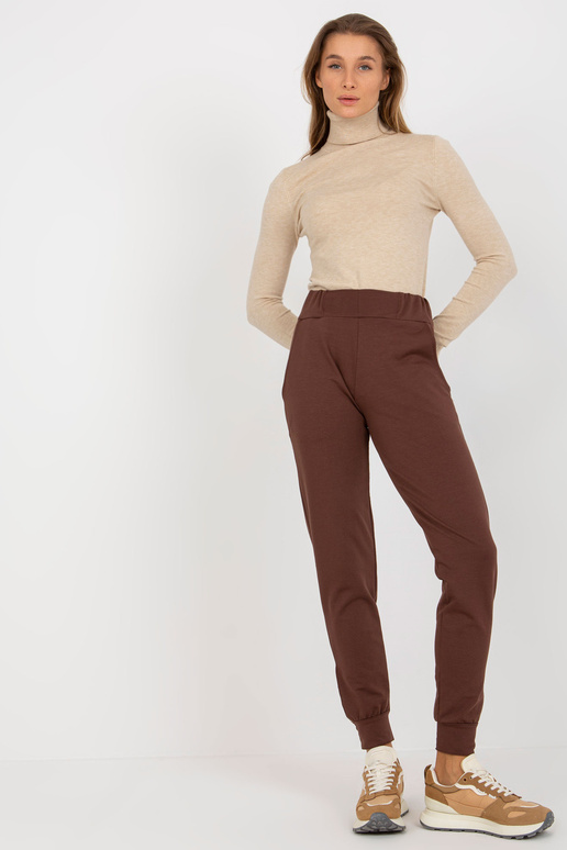 Hnědé tepláky se zapínáním na... Hnědé tepláky se zapínáním na...