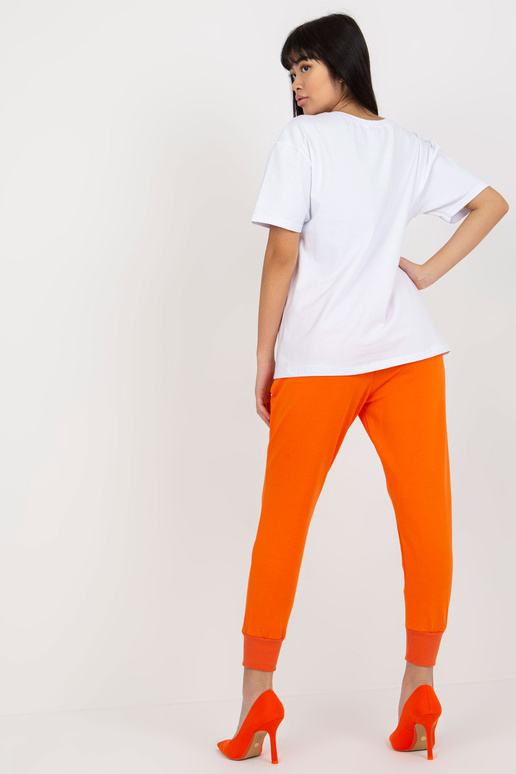 Bílé tričko s volným potiskem Bílé tričko s volným potiskem