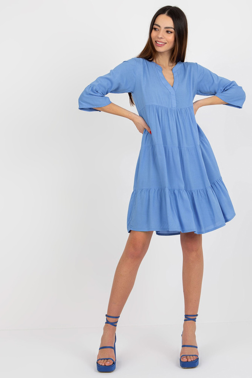 Světle modré volné šaty s volánem a...