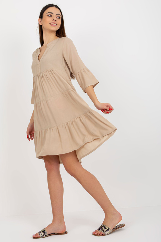Béžové letní šaty s volánem oversize...