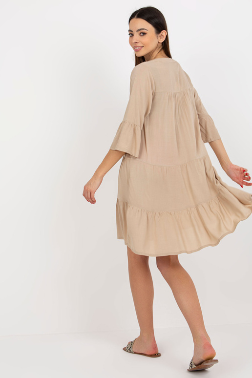 Béžové letní šaty s volánem oversize...