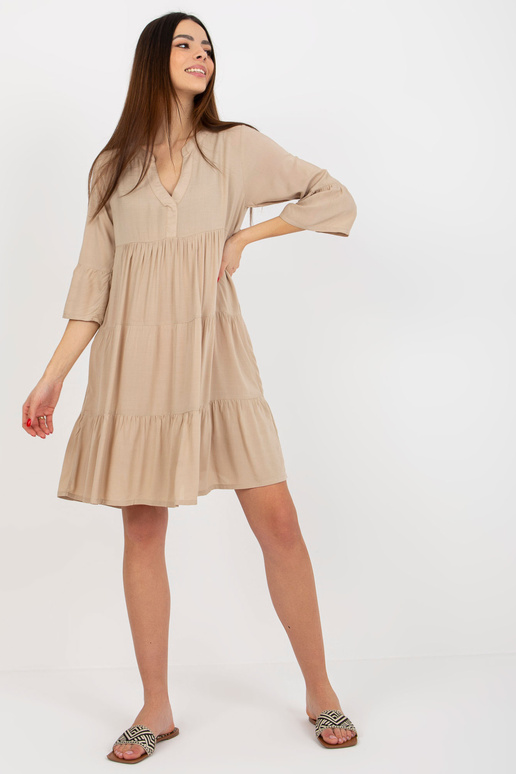Béžové letní šaty s volánem oversize...