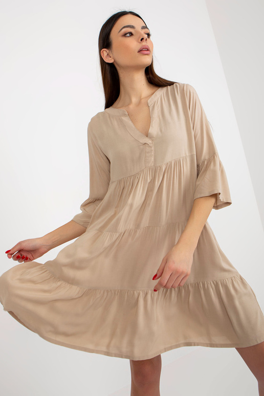 Béžové letní šaty s volánem oversize...