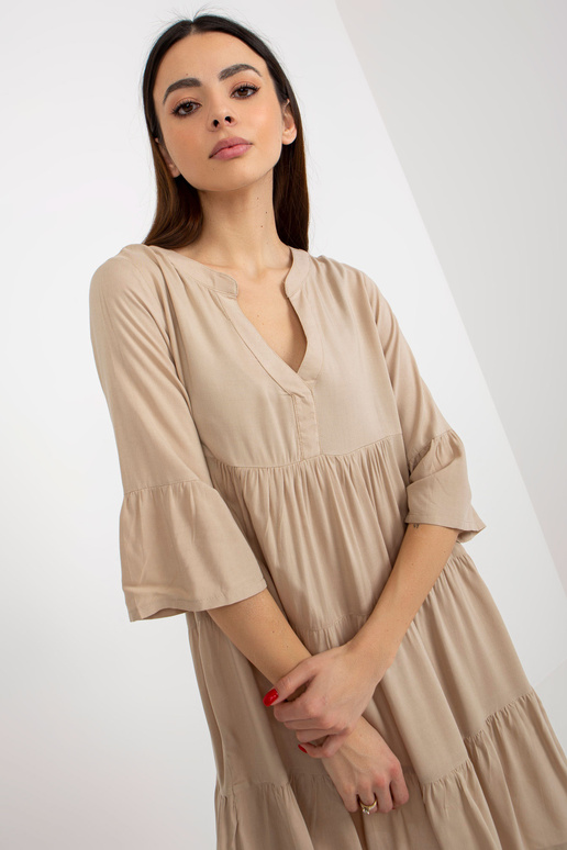Béžové letní šaty s volánem oversize...