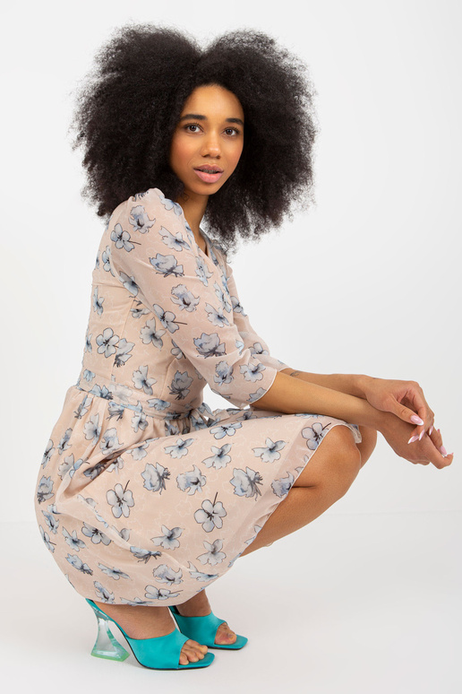 Béžové rozevláté šaty s potiskem a...