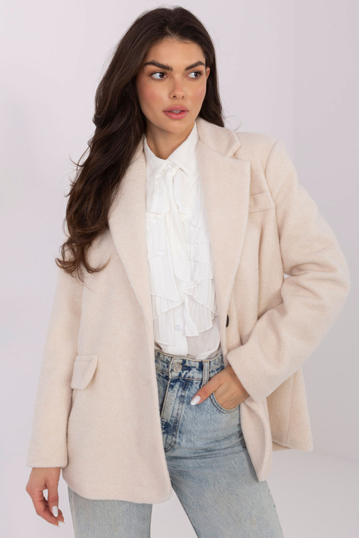 Modrý svetr světle pískové barvy