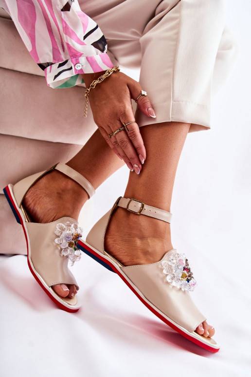 Sandaalid kaunistustega beeži värvi...